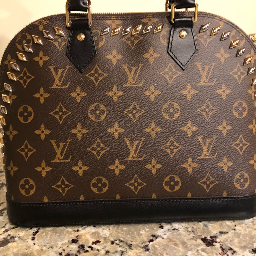 Louis Vuitton alma stones